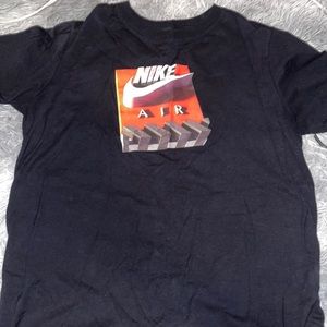 Nike t-shirt. Size large (women). Colour: Black